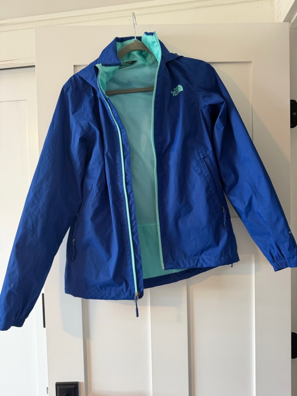 The North Face Blue Rain Jacket with Aqua Lining